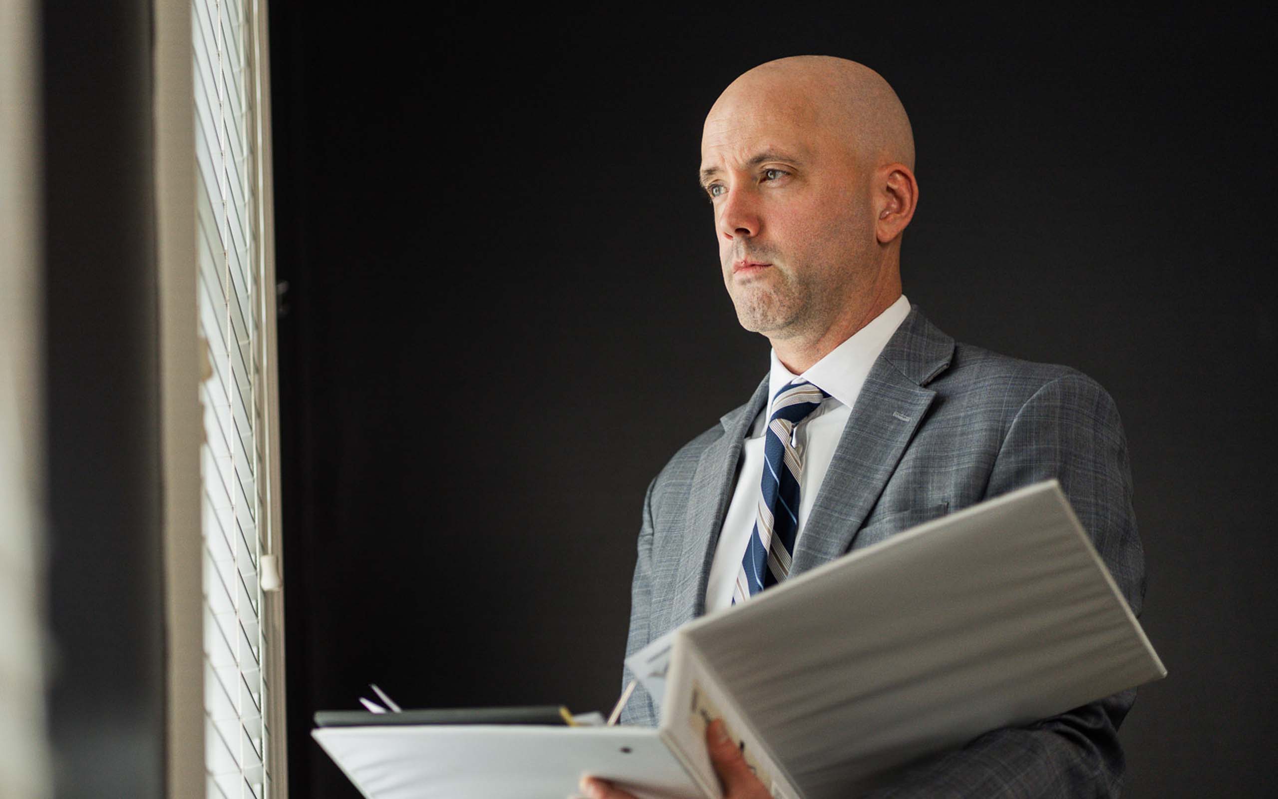 Jim O'Donnell looking out window